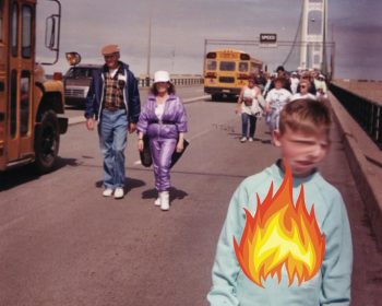 A group of people walking on a bridge with school buses parked. The image has a title, "When I Was a Fire (part 1 of Selfies)," and an author's name, "Ronnie Ferguson." A child in the foreground has a graphic of a flame over their torso.